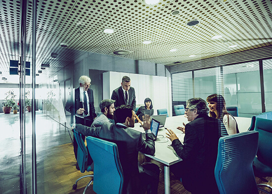 Business advisors collaborating around a meeting table