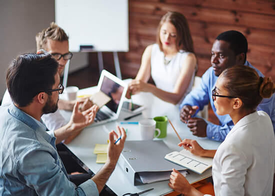 Business owners reviewing VAT registration and Making Tax Digital compliance