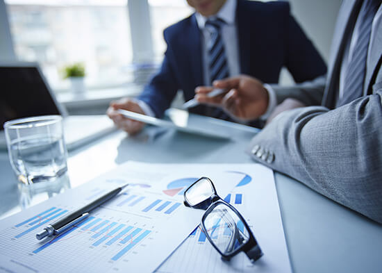 Accountant reviewing statutory accounts and financial reports